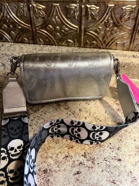 Betsey Johnson Silver Skull Embossed Crossbody Clutch w/ Skull Guitar Strap NWT
